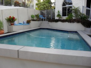 Re-tile Swimming Pool Area  