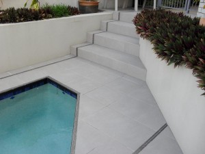 Re-tile Swimming Pool Area  