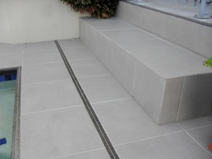 Re-tile Swimming Pool Area  